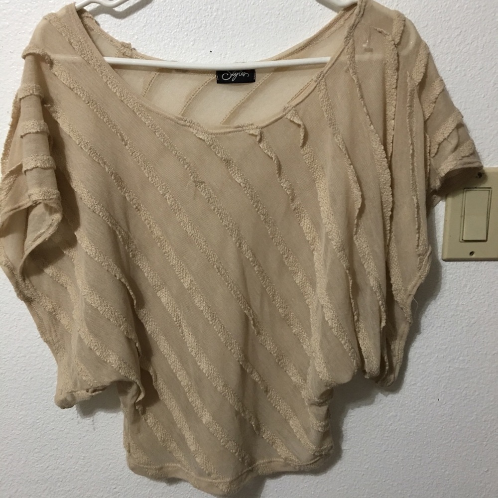 Bat winged top